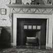 Three interiors showing fireplaces.
1. Fireplace decorated with swags of foliage and ribbons
2. Fireplace with marble surround
3. Fireplace with rococo carving