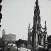 General view of Scott Monument from West with horses and carts on Princes Street