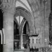 Interior.
View of pulpit and archways at junction of nave, aisle and NW transept.