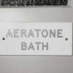 Edinburgh, Portobello, 57 Promenade, Portobello Baths.
Detail of 'Aeratone Bath' sign, interior.