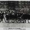 Photographic copy of a postcard.
View of R W Forsyth and C and A from the south, with the royal carriage in the foreground.
Insc: 'The Royal Visit to Edinburgh', 'Departure from Waverley Station - The Farewell Salute'.
