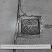 Detail of stop-cock cover, inscribed  'D. Blake & Co. Edinburgh'