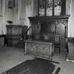 Interior. View showing Communion Table, War Memorial Screen and Pulpit by P R McLaren 1922.