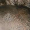 Interior. Wash house. Detail of stone floor