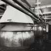 Edinburgh, Slateford Road, Caledonian Brewery, interior.
View of coppers.