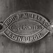 Edinburgh, Slateford Road, Caledonian Brewery, interior.
View of name plate. 
Insc: 'Archd. McMillan & Co. Coppersmiths, Edinburgh'.