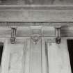 Detail of pilaster head and corbels in first floor hall.