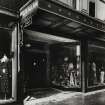 Copy of photograph showing view of South Bridge elevation to J and R Allan store, Edinburgh.