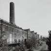 Edinburgh, Leith Walk, Shrub place, Shrubhill Tramway Workshops and Power Station
General exterior view from north west along south-west side of the works, showing the Boiler House and Chimney (left), and the gables of the Tinsmiths and Fibreglass Shops (centre distance)