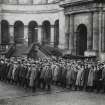University of Edinburgh Old College.
View of men standing in military fashion in main courtyard.