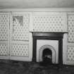 Edinburgh, Leith, 36 The Shore and 59-65 Bernard Street, interior.
View of North-East apartment, second floor, East wing, showing panelling and stone bolletion-moulded fireplace on East wall.
