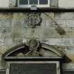 Steeple, north east facade, detail of heraldic plaque.
