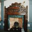 Interior, main South room, detail of fireplace on East wall.