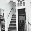 Interior. First floor. Landing showing stair, archway,  fanlight and WC