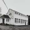 Edinburgh, West Mill Road, West Mills.
View from E of detached two-storeyed, white rendered gabled block at N end of the site.