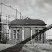 Edinburgh, Granton Gasworks, Meter House
View from W, gasholder no.1 (c.1899) behind with common feed leg (left)