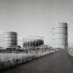 Edinburgh, Granton Gasworks, N area, general view
General view from S of gasholders 2, 1 and 3 with Meter House (left) and Pumping Station (right). Workshops visible on extreme right and redundant pre-1957 return cooling water pipes (left). This cooled all the water used in processes within the works