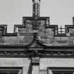 Detail of chimney, shield and carved pediment on south front