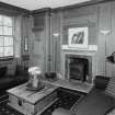 Interior. Second floor. Drawing room showing fireplace and panelling