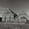 View from ESE, showing out-buildings on NE side of church