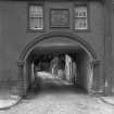 Copy of historic photograph showing general view of archway.