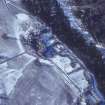 Aerial view of Mar Lodge and surrounding buildings in the snow.