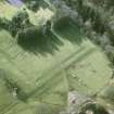 Oblique aerial view centred on the grounds adjacent to the tower-house, taken from the E.