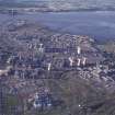 Oblique aerial view centred on the oil refinery, taken from the SSW.