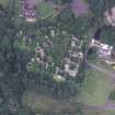 Oblique aerial view centred on the remains of the country house, taken from the S.