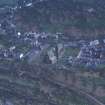 Oblique aerial view centred on the mine and buildings with farmstead adjacent, taken from the NW.