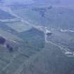 Oblique aerial view centred on the mine and buildings with farmstead adjacent, taken from the WSW.