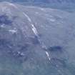 Oblique aerial view centred on the mine and buildings, taken from the SW.