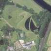 Oblique aerial view centred on the garden and country house, taken from the SE.
