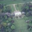 Oblique aerial view of house and gardens taken from the S