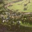 Oblique aerial view centred on Inveresk Gate, church and burial-ground, taken from the NNW.