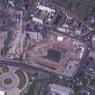 Oblique aerial view centred on the Scottish Parliament under construction, taken from the SE.