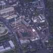 Oblique aerial view centred on the Scottish Parliament under construction with 'Our Dynamic Earth' adjacent, taken from the E.