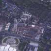 Oblique aerial view centred on the Scottish Parliament under construction with 'Our Dynamic Earth' adjacent, taken from the SE.