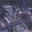 Oblique aerial view centred on the Scottish Parliament under construction, taken from the SSE.