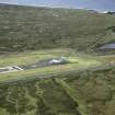 Oblique aerial view centred on the airfield, taken from the SE.