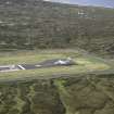 Oblique aerial view centred on the airfield, taken from the SE.