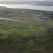 Oblique aerial view centred on the airfield, taken from the SE.
