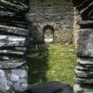 Excavation of cross-base, Kilnave Church, Kilnave.
View through window in East gable through West door towards excavation.