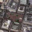 Oblique aerial view centred on George Square and the City Chambers