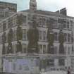 Glasgow, Fairley Street
General view of tenement block with high rise in background.