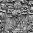 Detail of headstone to Margaret Ramsey d.1772 with carved watchmaker's tools, Inverarity Church burial ground.