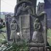 View of headstone 1752 showing figures of Ramsay children and winged soul,  Panbride Parish Churchyard.