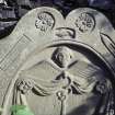 Detail of headstone with winged soul, comb and shuttle, Abernethy Parish Churchyard.