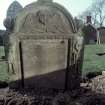 View of headstone to Kinninmount children1748 with winged soul, skeletons, Inchture Churchyard