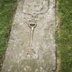 View of tablestone 1706 with sexton's shovel,  Rhynd Old Parish Church burial ground